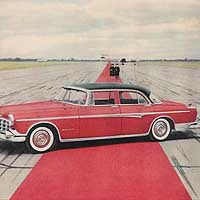 1955 Imperial ad, red car on airport runway.