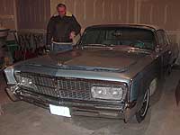 Carl examining his newly purchased 1965 Imperial convertible